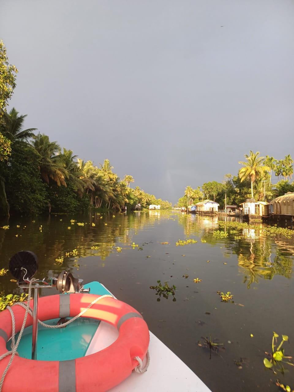 Sunset cruise through Aymanam village canals